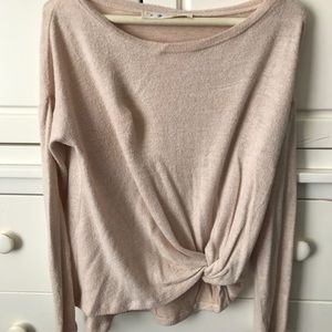 Sweater with tie knot bottom